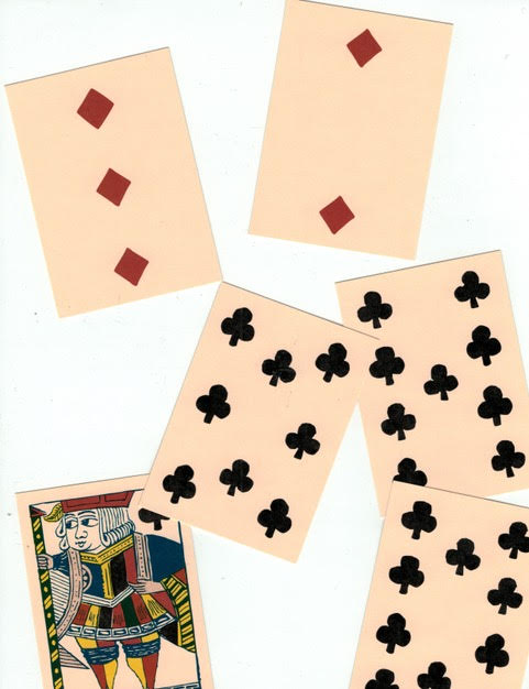 six scattered playing cards
