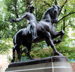 the famous bronze statue of Paul Revere on horseback in the Paul Revere mall in Boston