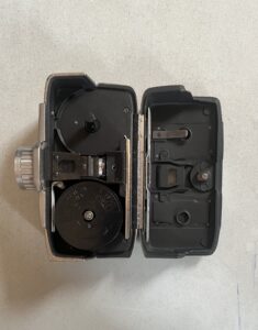 A view of the film compartments and internal workings of a Revere Camera Company video camera