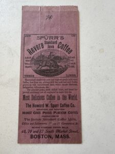 The front of a purple bag for Spurr's Revere Standard Java Coffee