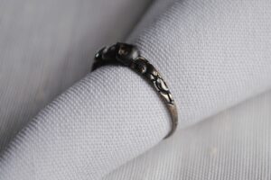 detail of the engravings on rachel revere's ring