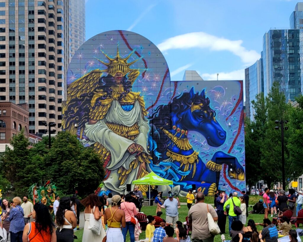 A photograph of the official opening of Rixy's Dewey Square mural,