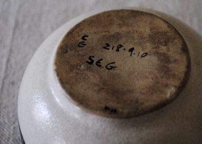 Detail on the bottom of the bowl showing the number 2.8.9.10 and the initials CG and S.E.G.